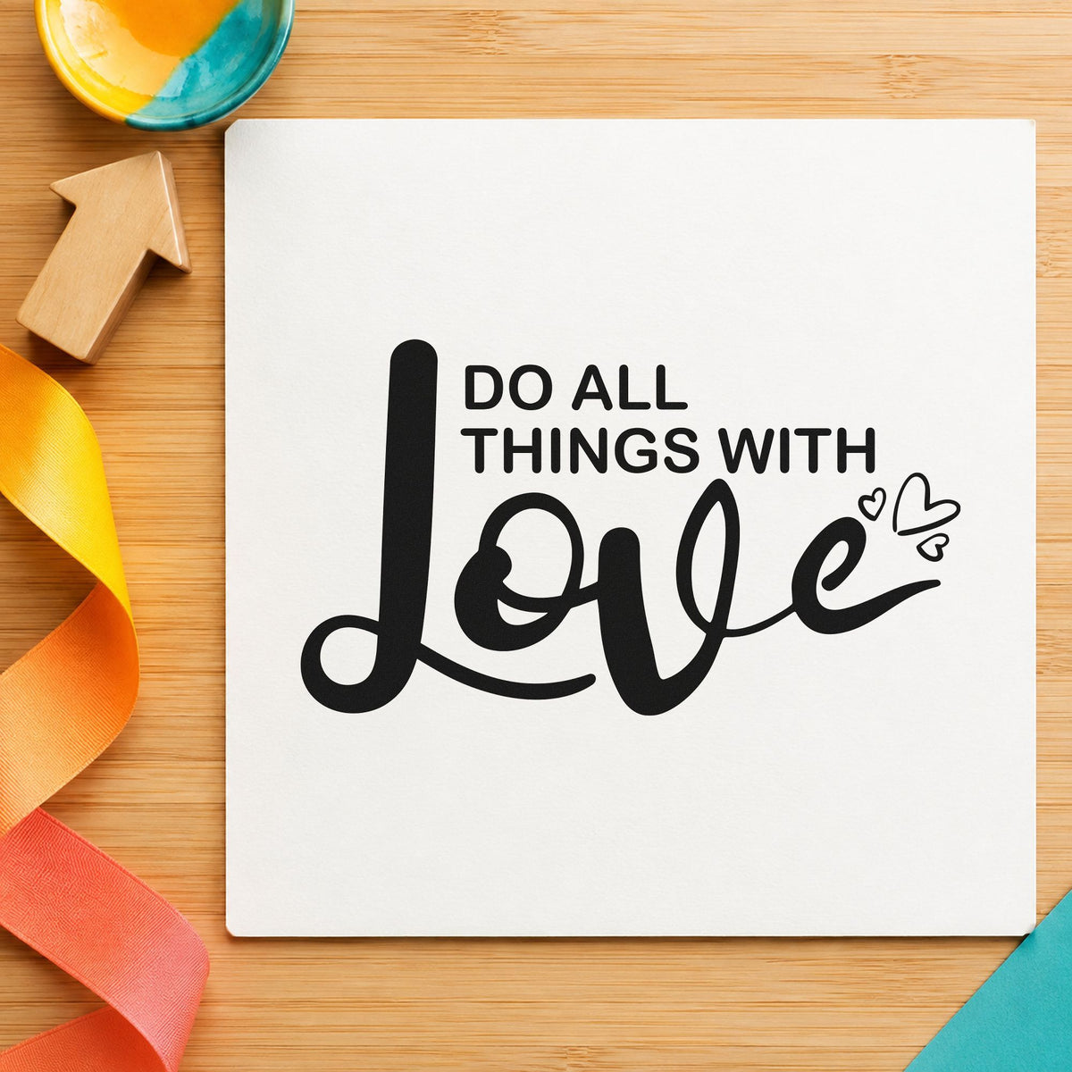 Do All Things With Love craft stamp imprint in black ink on a handmade project, one idea being handmade gift tags.