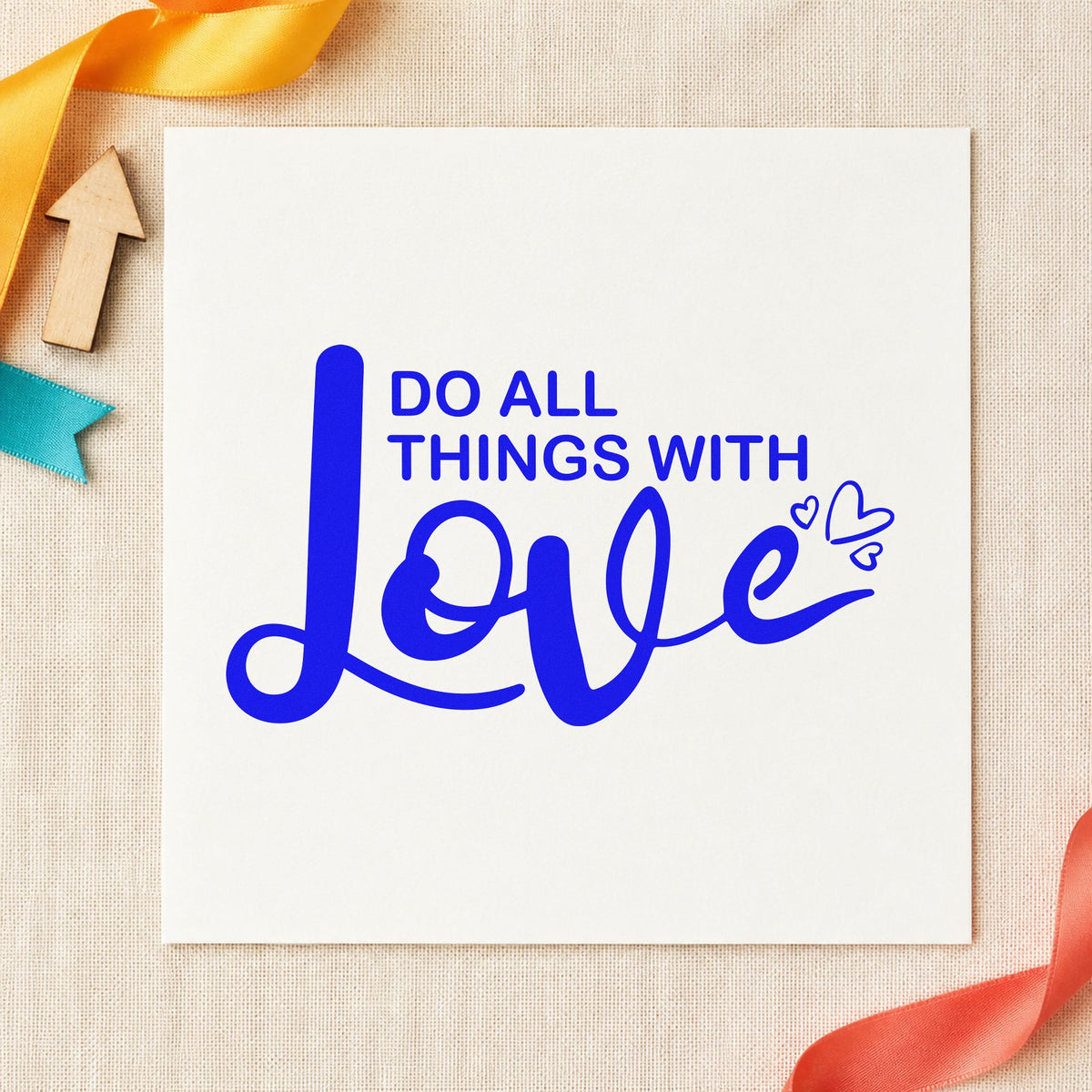 Do All Things With Love craft stamp imprinted in blue ink on paper, a design suited to framed craft room.