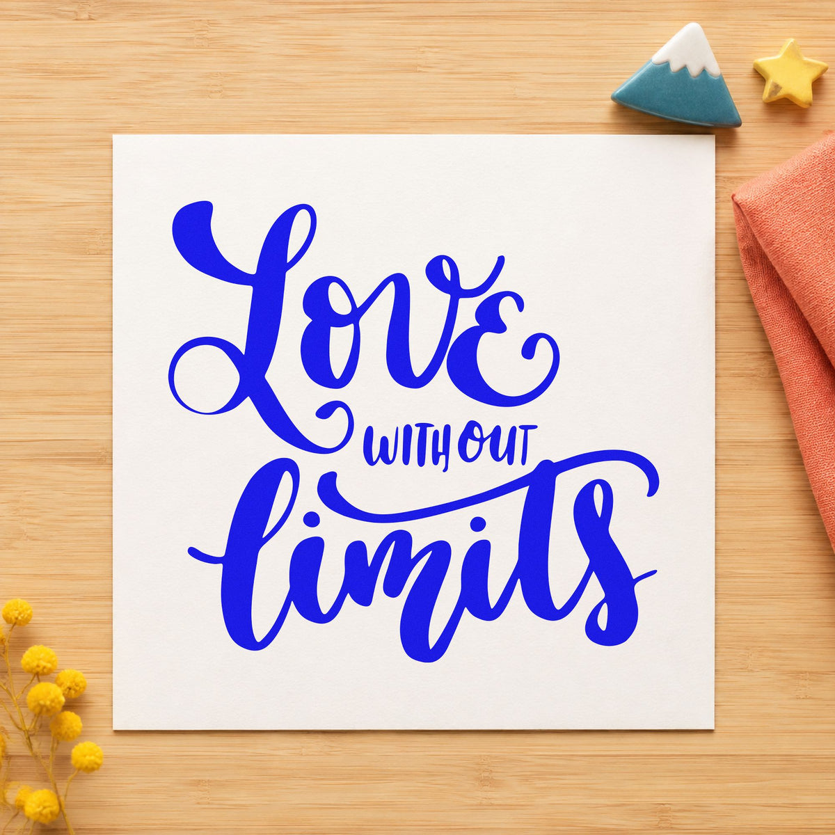 Love Without Limits Script craft stamp in blue ink on cardstock, an easy option for quilt binding printing.