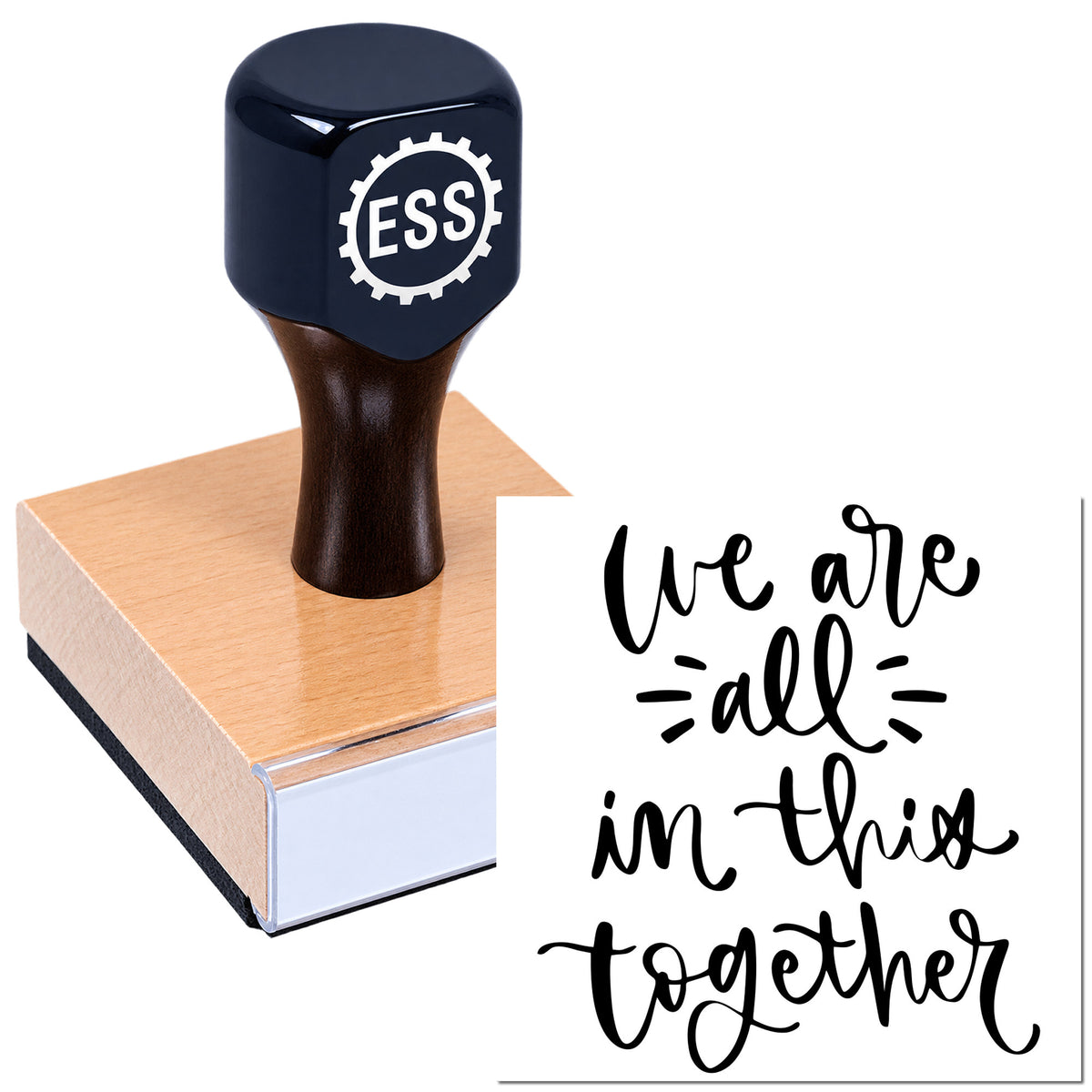 Dark blue ESS stamp and seal on a wood block beside black script text reading "We are all in this together"