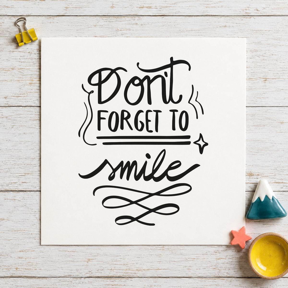 Don't Forget To Smile craft stamp in black ink on cardstock, an easy option for practice album page.