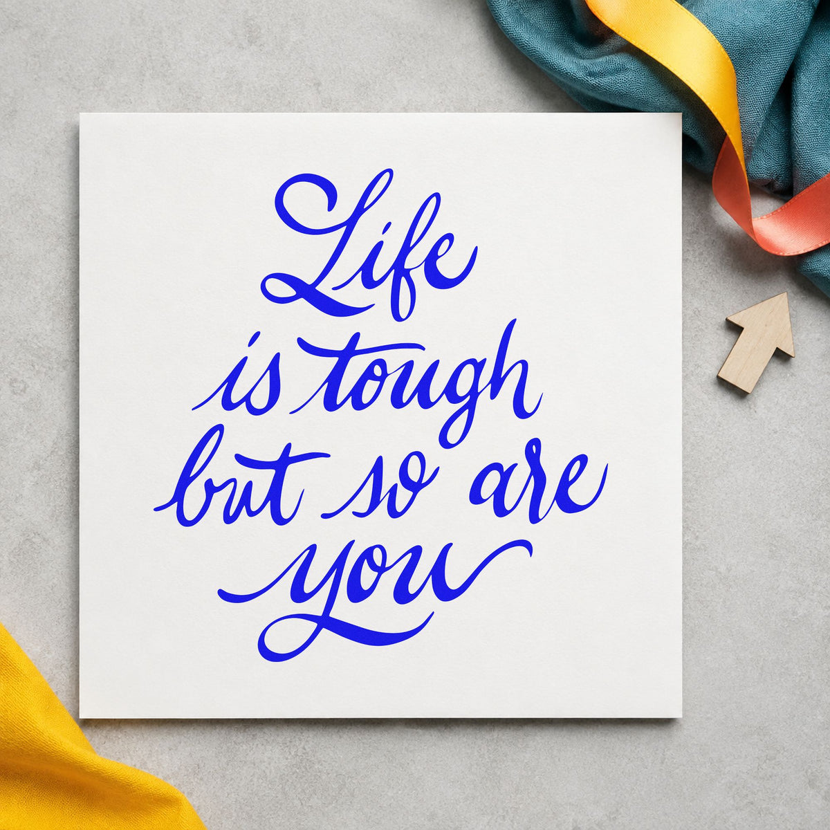 Life Tough So Are You craft stamp imprinted in blue ink on paper, a design suited to framed barn office.