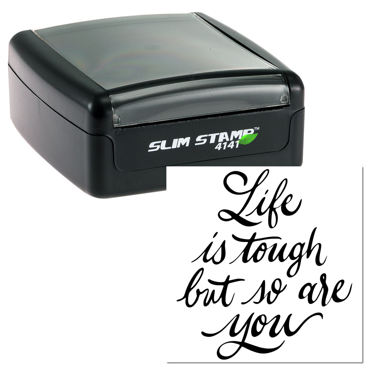 Black Slim Stamp 4141 self-inking seal with clear gray cap beside white card reading Life is tough but so are you.
