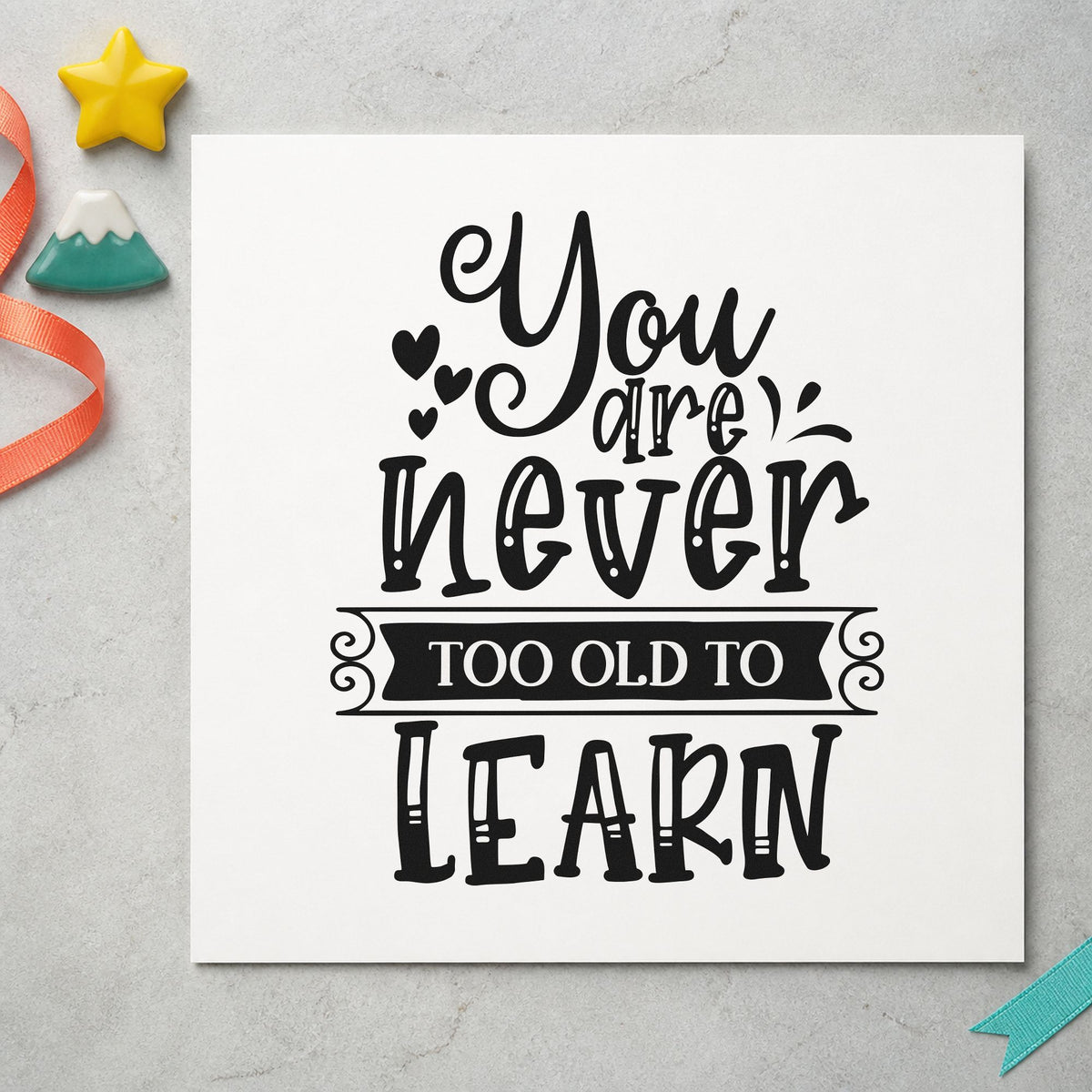 Never Too Old To Learn craft stamp in black ink on cardstock, an easy option for night class album page.