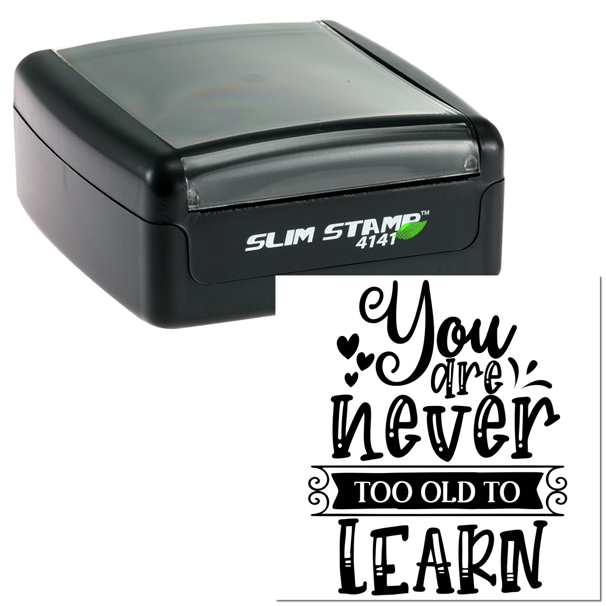Black self-inking stamp with gray translucent top and a decorative You are never too old to learn seal imprint.