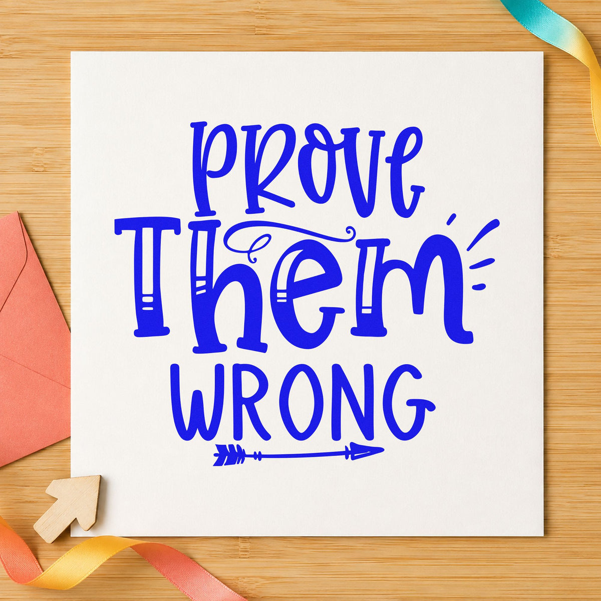 Prove Them Wrong Decorative craft stamp in blue ink on cardstock, an easy option for team tee printing.