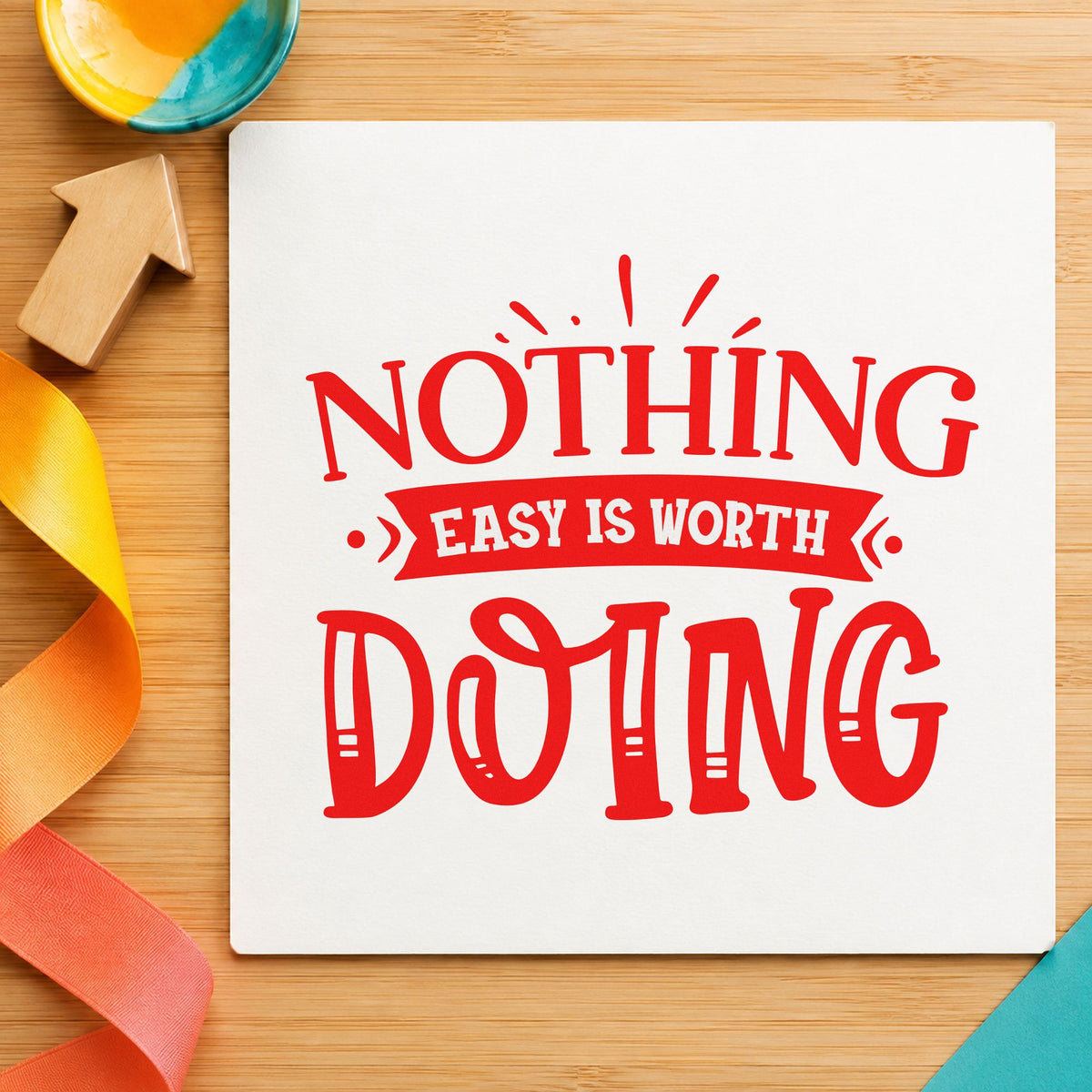 Nothing Easy Is Worth Doing rubber stamp shown in red ink, stamped for projects such as bin resupply labels.