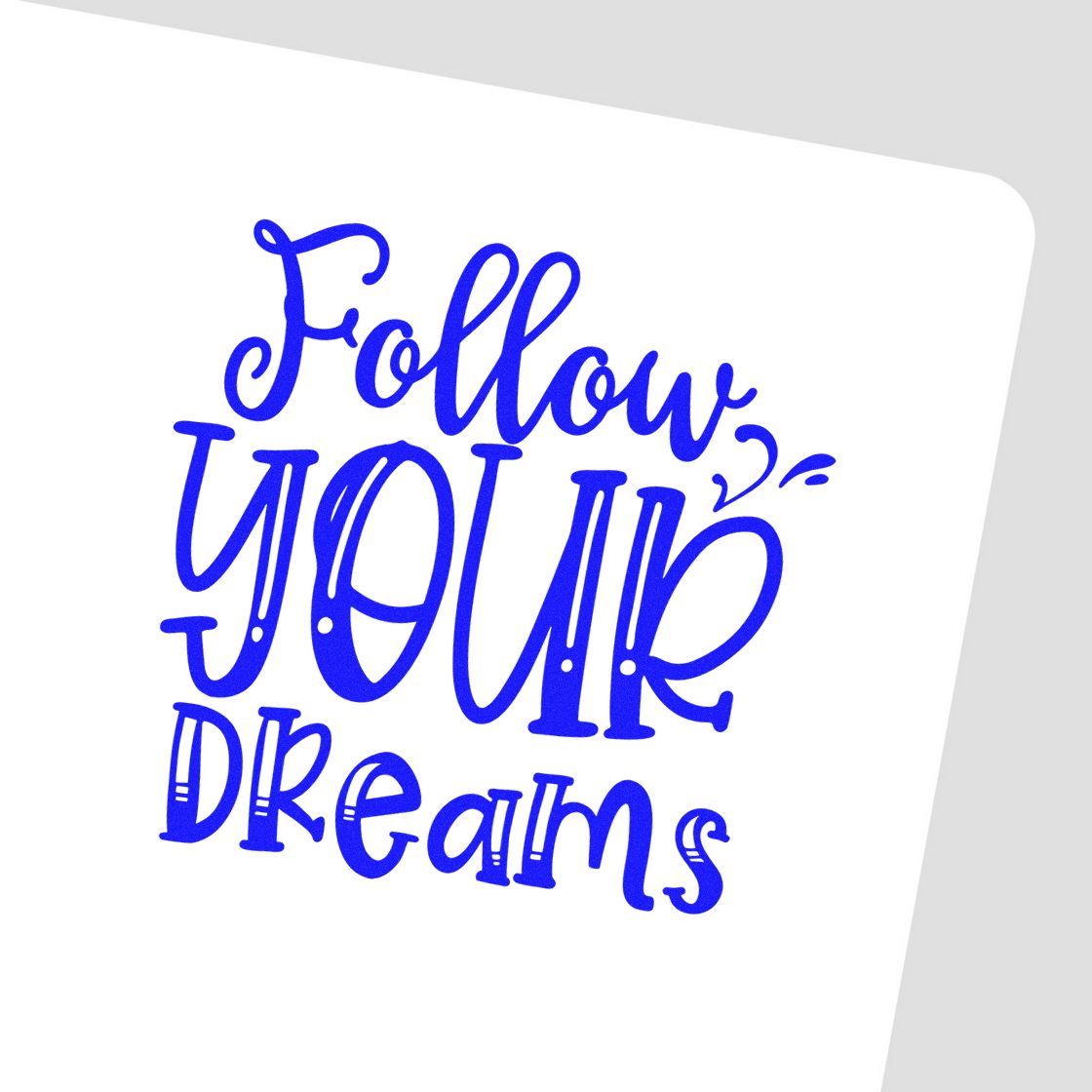 Blue decorative rubber stamp/seal reading Follow your dreams on a white background.