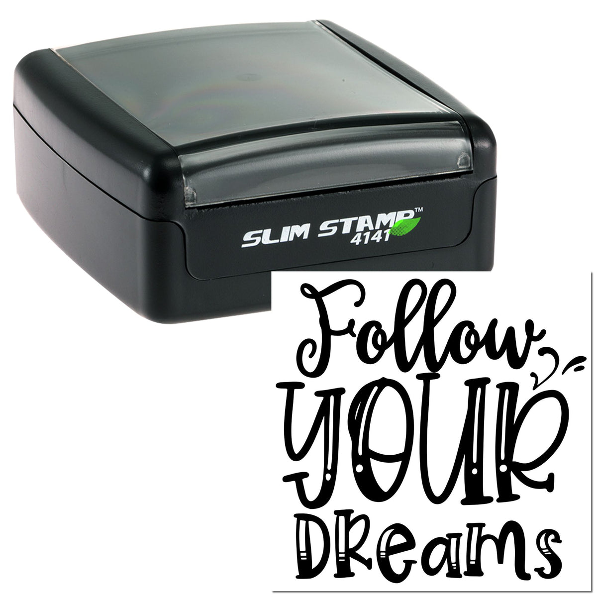 Black slim self-inking stamp with translucent gray top and white sample seal reading Follow your dreams in bold script.