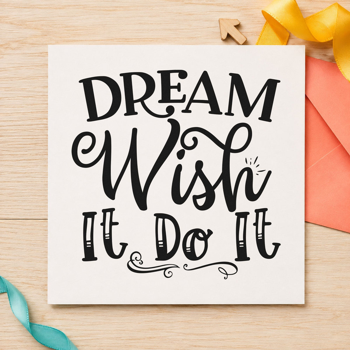 Dream Wish Do It craft stamp imprint in black ink on a handmade project, one idea being board kit gift tags.