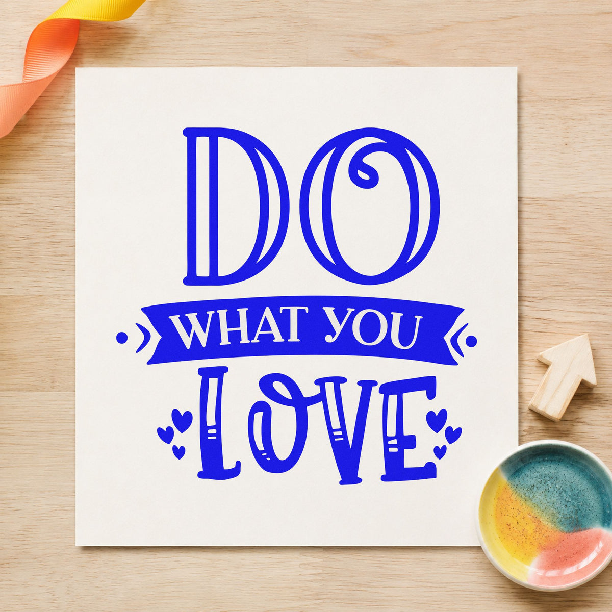 Do What You Love craft stamp in blue ink on cardstock, an easy option for canvas tote printing.
