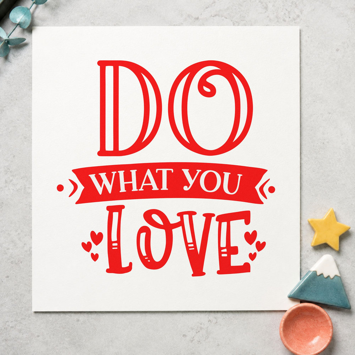 Do What You Love craft stamp imprint in red ink on a handmade project, one idea being staff pick cards.
