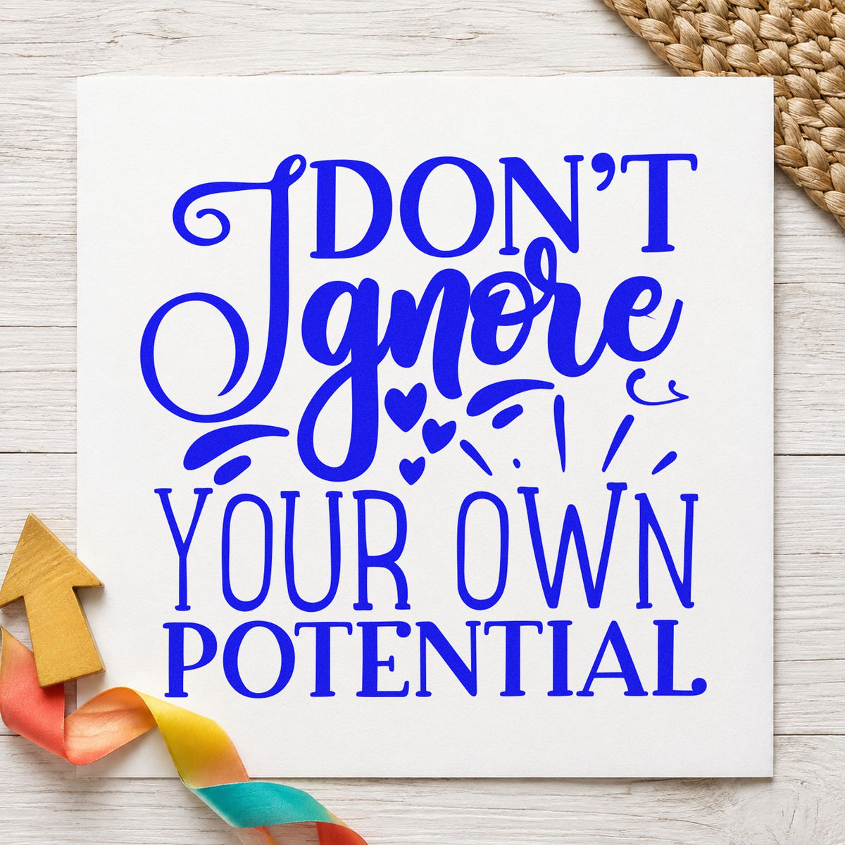 Don't Ignore Your Potential craft stamp in blue ink on cardstock, an easy option for tool belt printing.