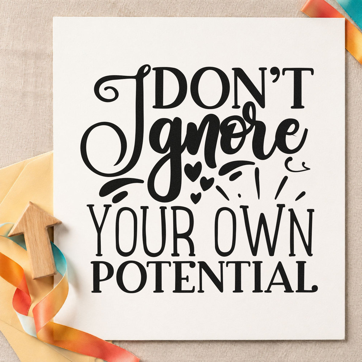 Don't Ignore Your Potential rubber stamp printed in black ink, ready for heart ray cards and similar paper crafts.