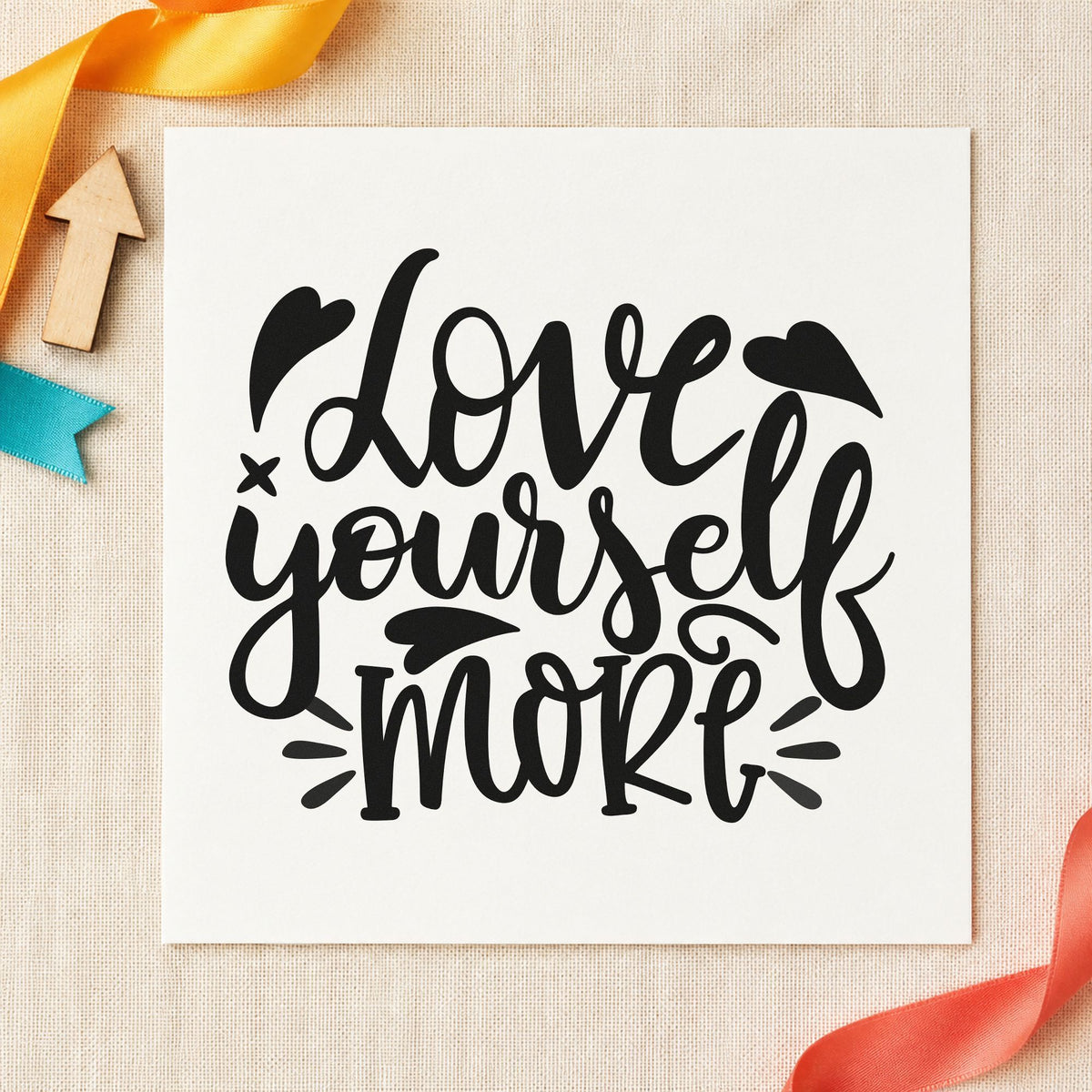 Love Yourself More Hearts craft stamp in black ink on cardstock, an easy option for practice album page.