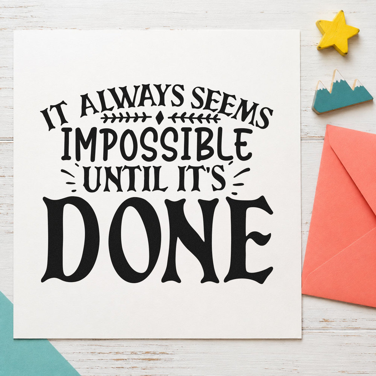Impossible Until It's Done craft stamp imprint in black ink on a handmade project, one idea being part box gift tags.