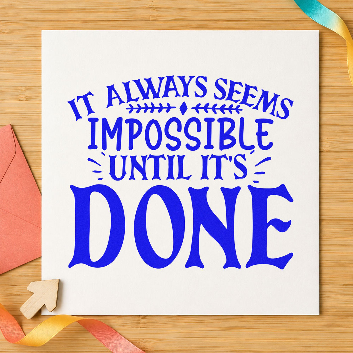 Impossible Until It's Done craft stamp imprinted in blue ink on paper, a design suited to framed garage bay.