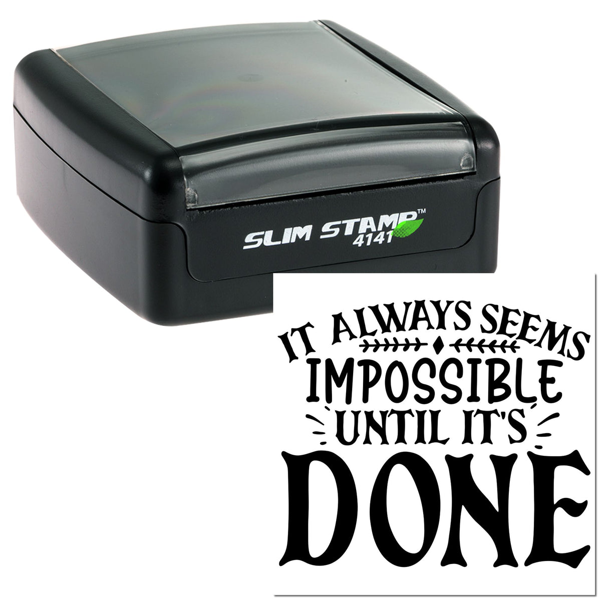 Black self-inking slim stamp with gray cover, showing It always seems impossible until its done in bold decorative lettering.