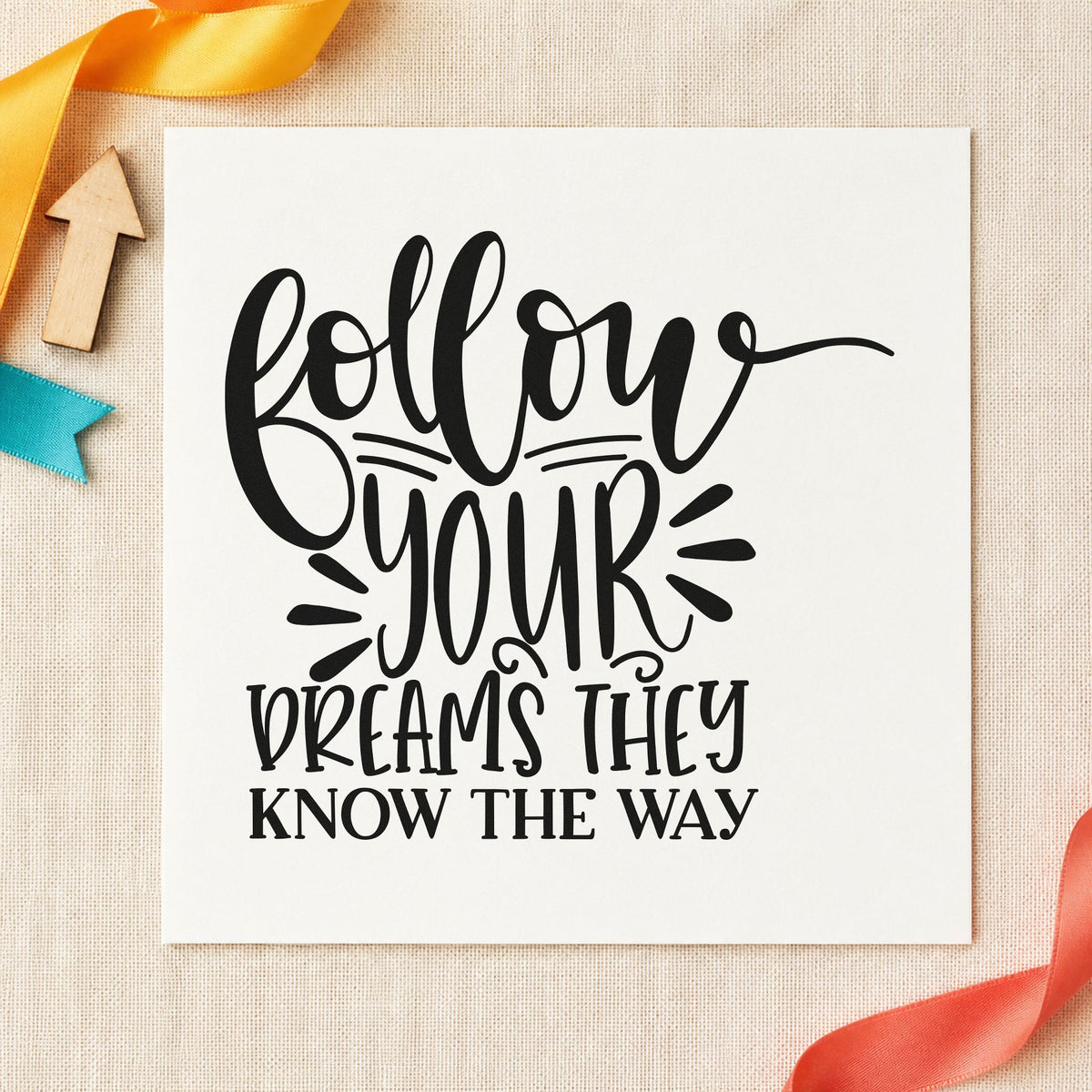 Follow Dreams Know The Way craft stamp imprint in black ink on a handmade project, one idea being journal gift tags.