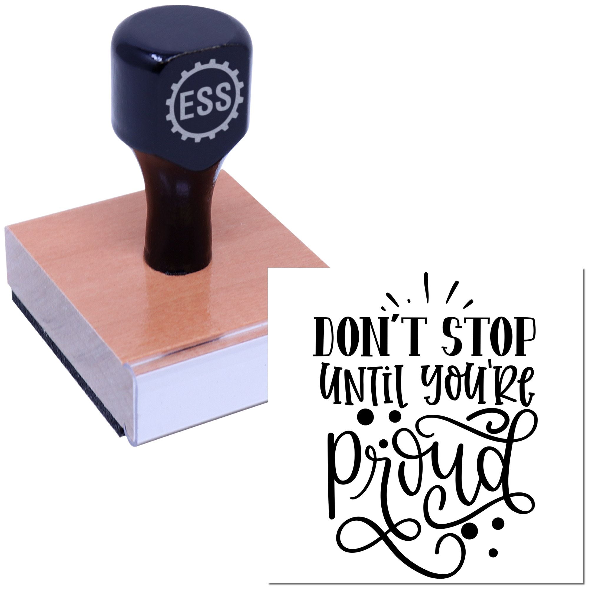 Dark navy ESS custom stamp on pink wood block with black Dont Stop Until Youre Proud seal design