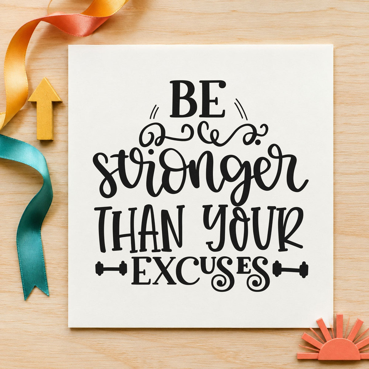 Stronger Than Your Excuses craft stamp imprint in black ink on a handmade project, one idea being band set gift tags.