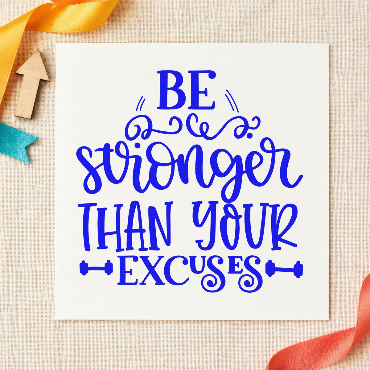 Stronger Than Your Excuses craft stamp in blue ink on cardstock, an easy option for wall banner printing.