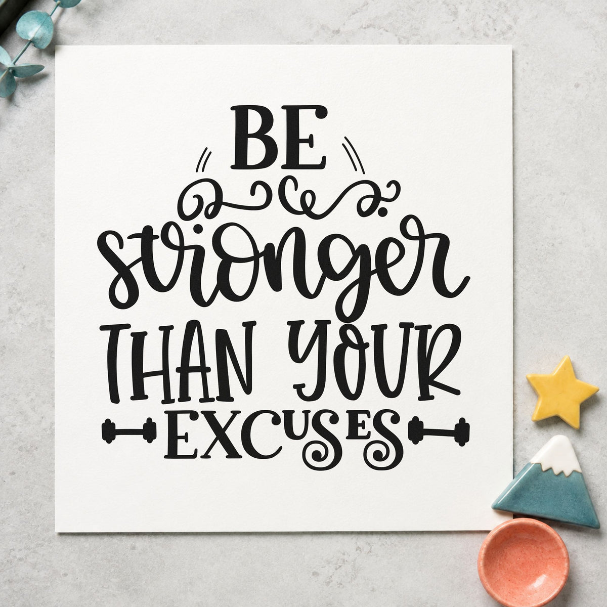 Stronger Than Your Excuses rubber stamp printed in black ink, ready for curled weight cards and similar paper crafts.