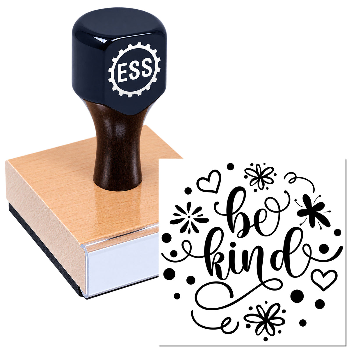 Black custom rubber stamp and seal on a wooden block, featuring a white "be kind" floral design.