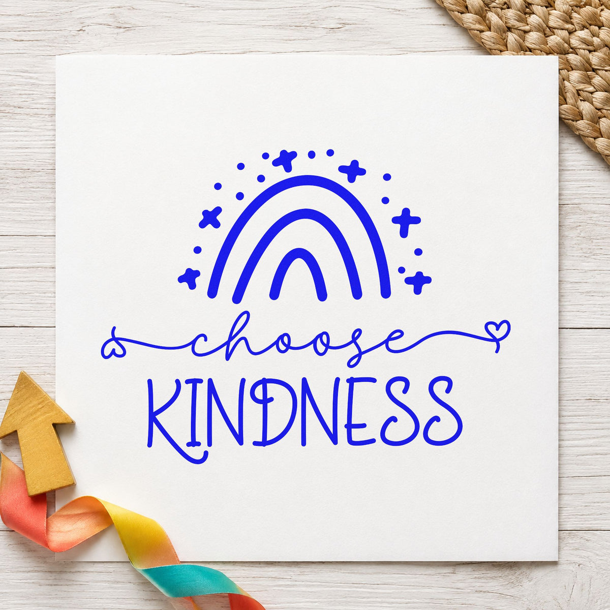 Choose Kindness Starry Rainbow craft stamp in blue ink on cardstock, an easy option for story rug printing.