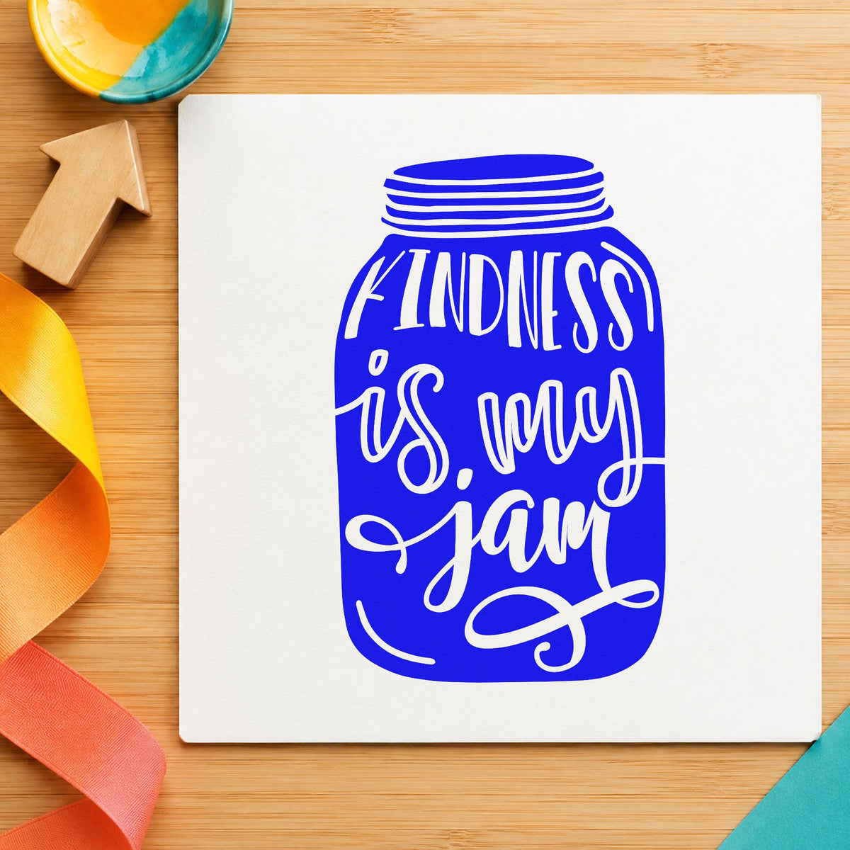 Kindness Is My Jam Jar craft stamp in blue ink on cardstock, an easy option for stage drape printing.