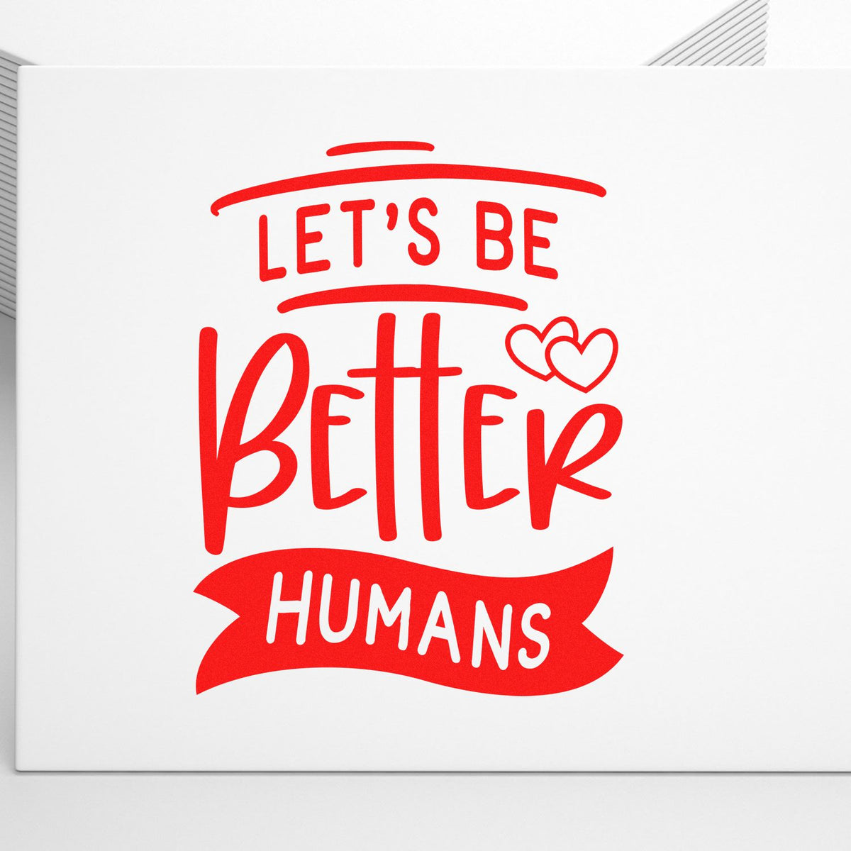 Red Lets Be Better Humans stamp and seal design with heart icons on a white background.