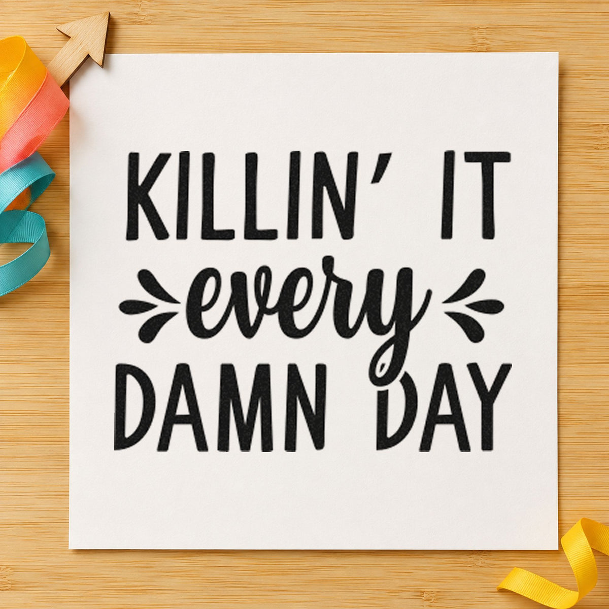 Killin It Every Damn Day craft stamp imprint in black ink on a handmade project, one idea being aftercare gift tags.