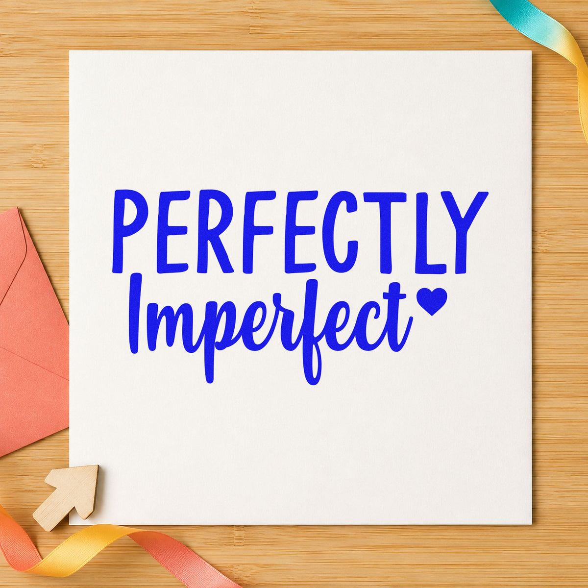 Perfectly Imperfect Small Heart craft stamp in blue ink on cardstock, an easy option for dye apron printing.