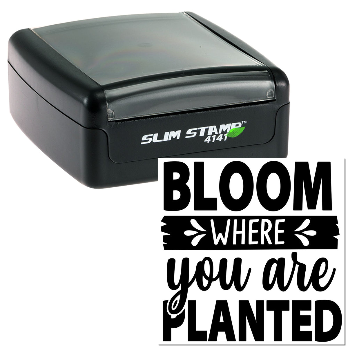 Black self-inking stamp and seal with gray top, featuring Bloom Where You Are Planted in bold black script.