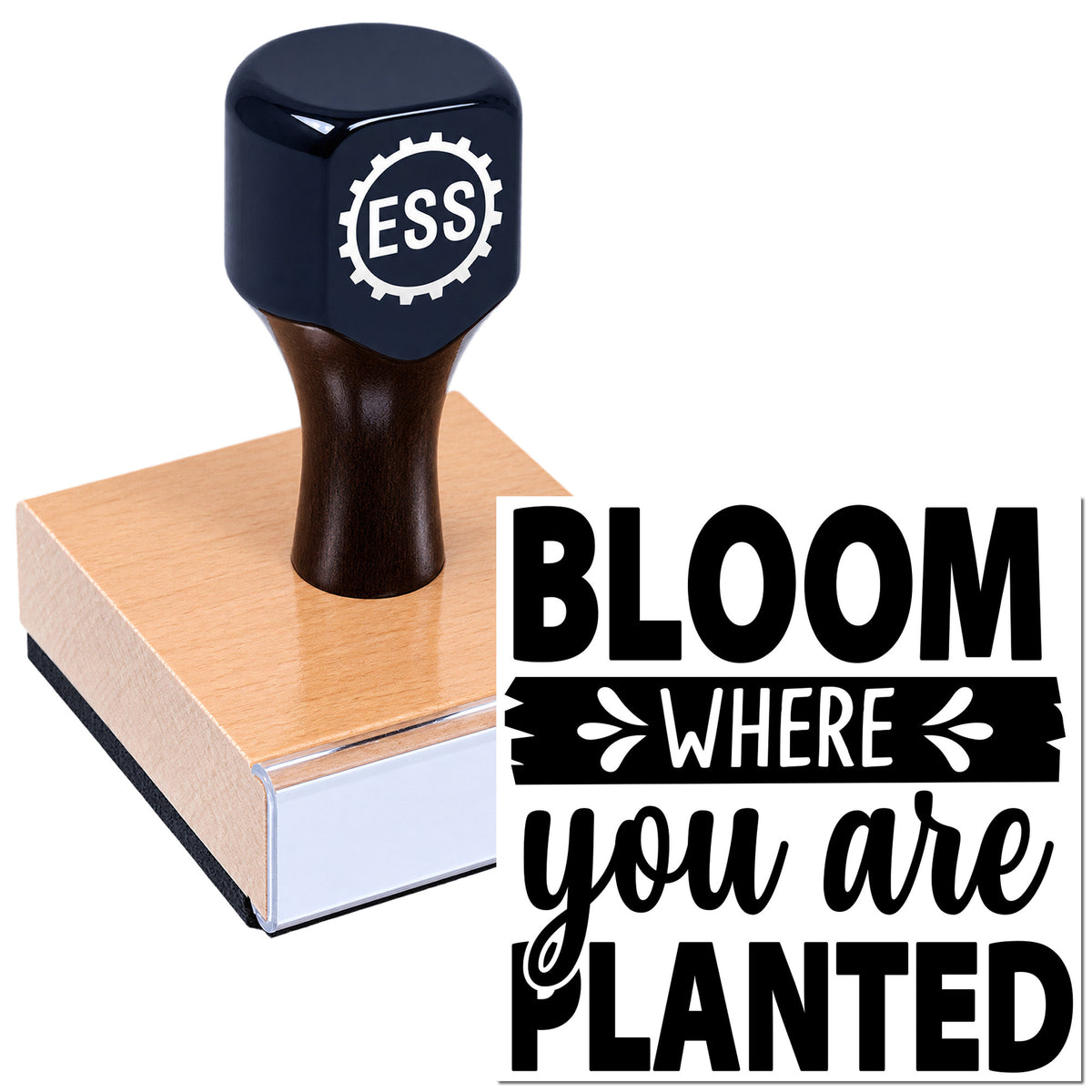 Custom rubber stamp and seal with dark blue handle, pink base, ESS gear logo, and bold black "Bloom where you are planted" text.