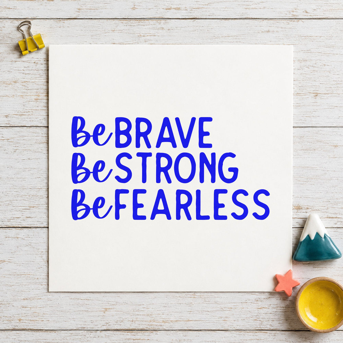 Be Brave Strong Fearless craft stamp in blue ink on cardstock, an easy option for duffel panel printing.