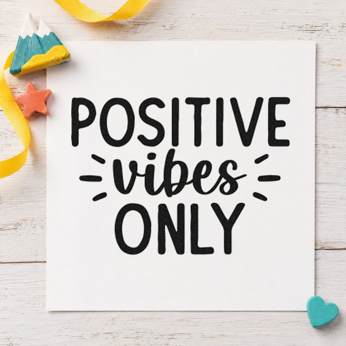 Positive Vibes Only Rays craft stamp in black ink on cardstock, an easy option for rental album page.