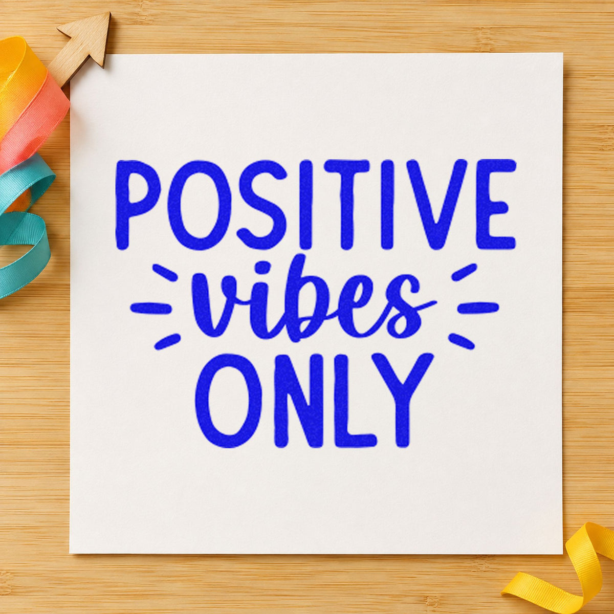 Positive Vibes Only Rays craft stamp in blue ink on cardstock, an easy option for beach towel printing.