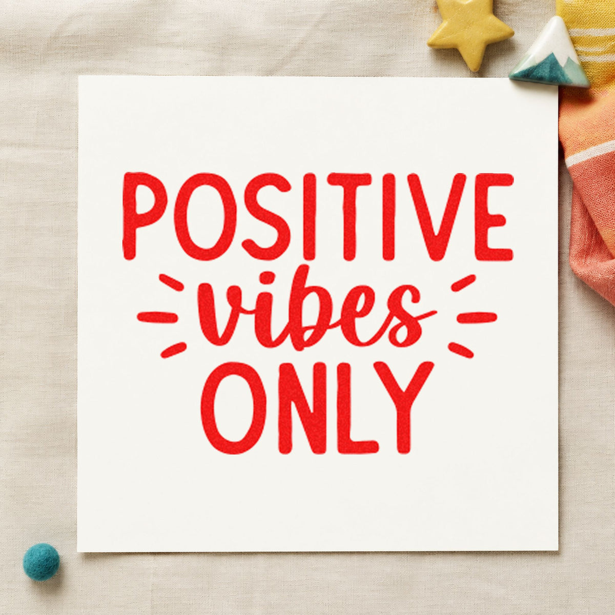 Positive Vibes Only Rays craft stamp imprint in red ink on a handmade project, one idea being house guide cards.