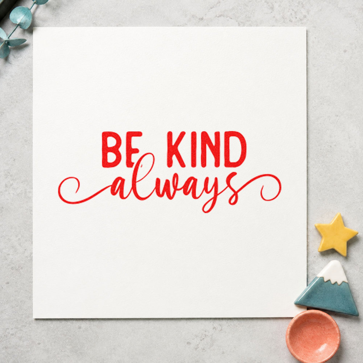 Be Kind Always Script craft stamp imprint in red ink on a handmade project, one idea being prompt question cards.