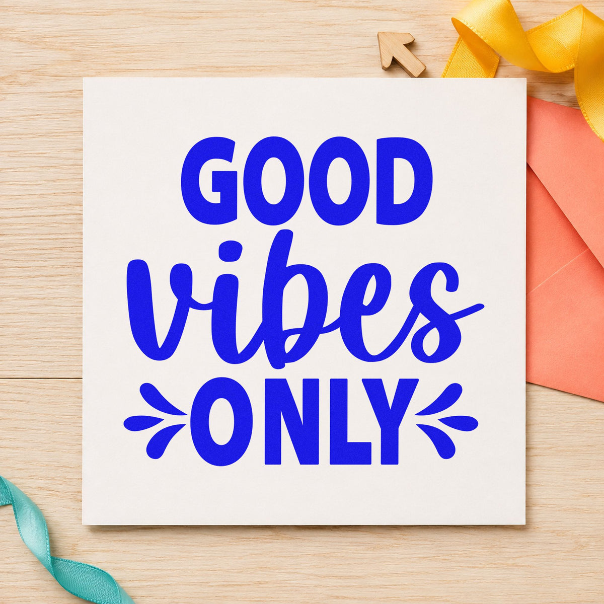 Good Vibes Only Splashes craft stamp imprinted in blue ink on paper, a design suited to framed prep galley.