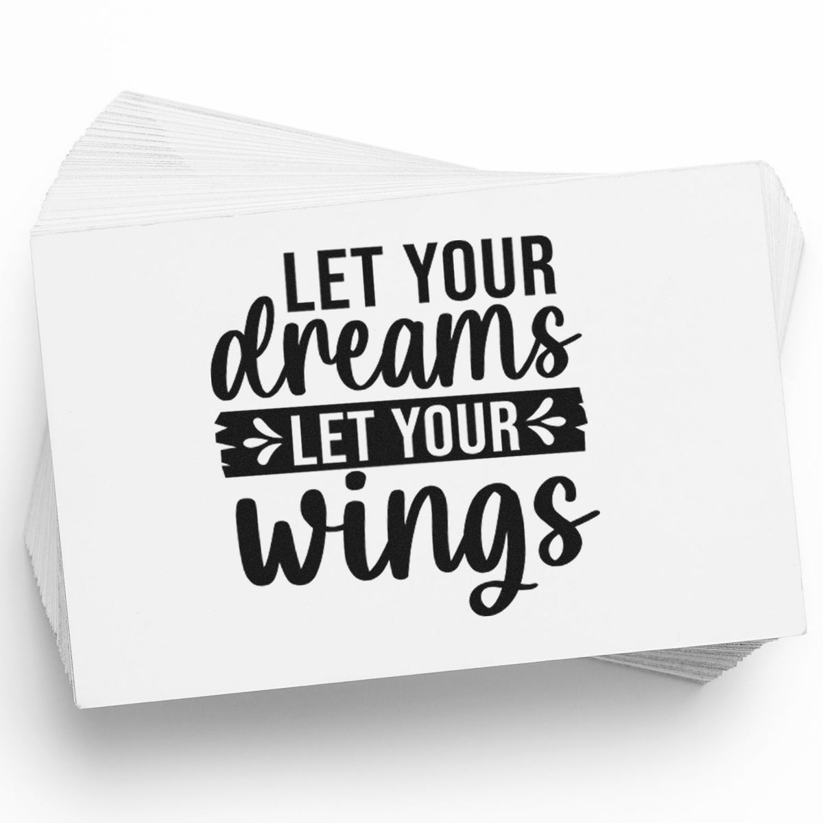 Stack of white custom stamp and seal cards with black Let your dreams let your wings lettering