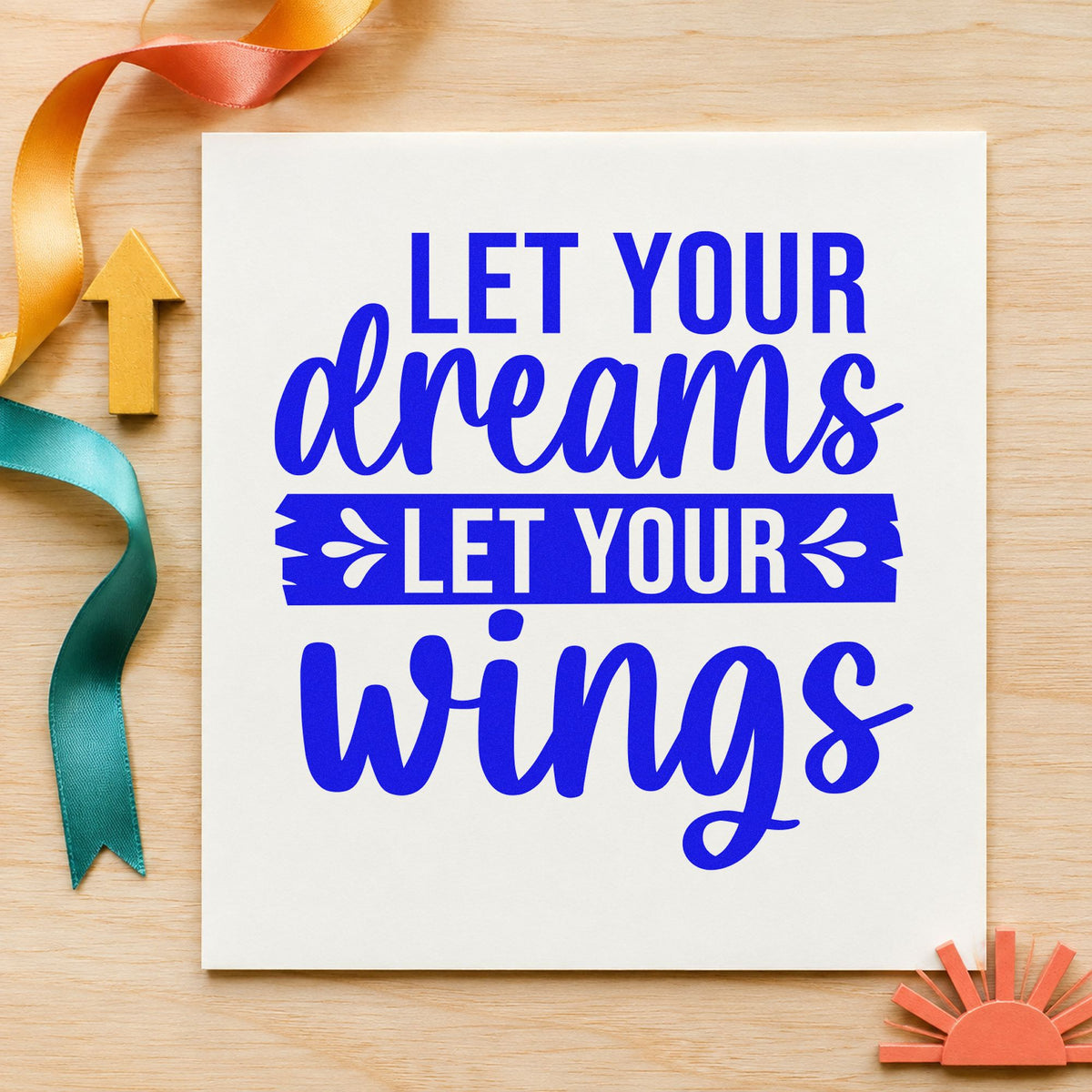 Let Your Dreams Wings craft stamp imprinted in blue ink on paper, a design suited to framed patio post.