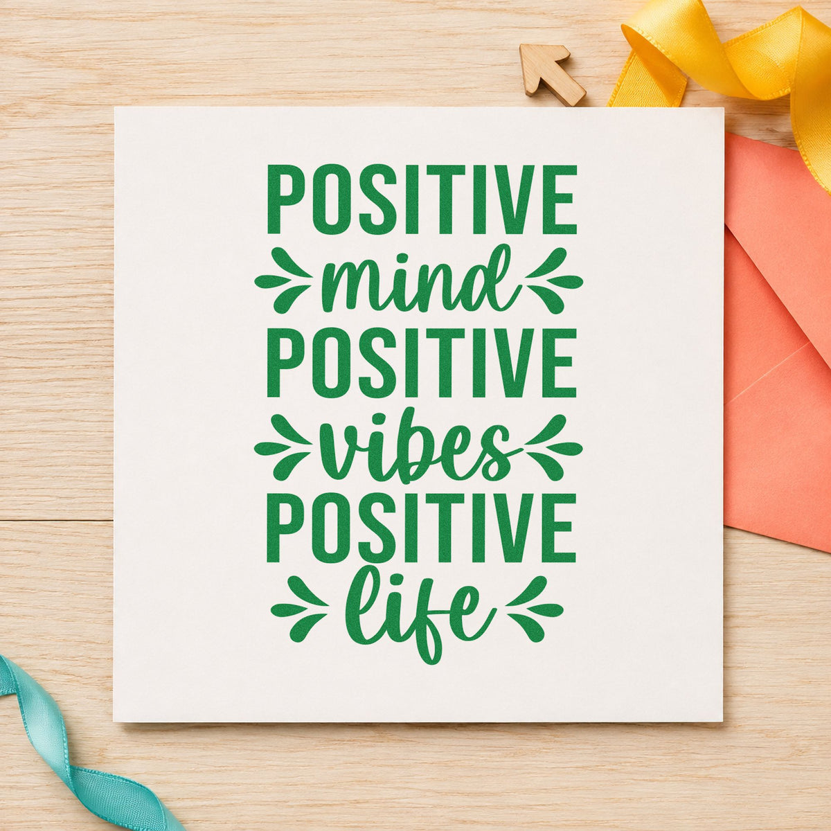 Positive Mind Vibes Life craft stamp imprint in green ink on a handmade project, one idea being prep plan cards.