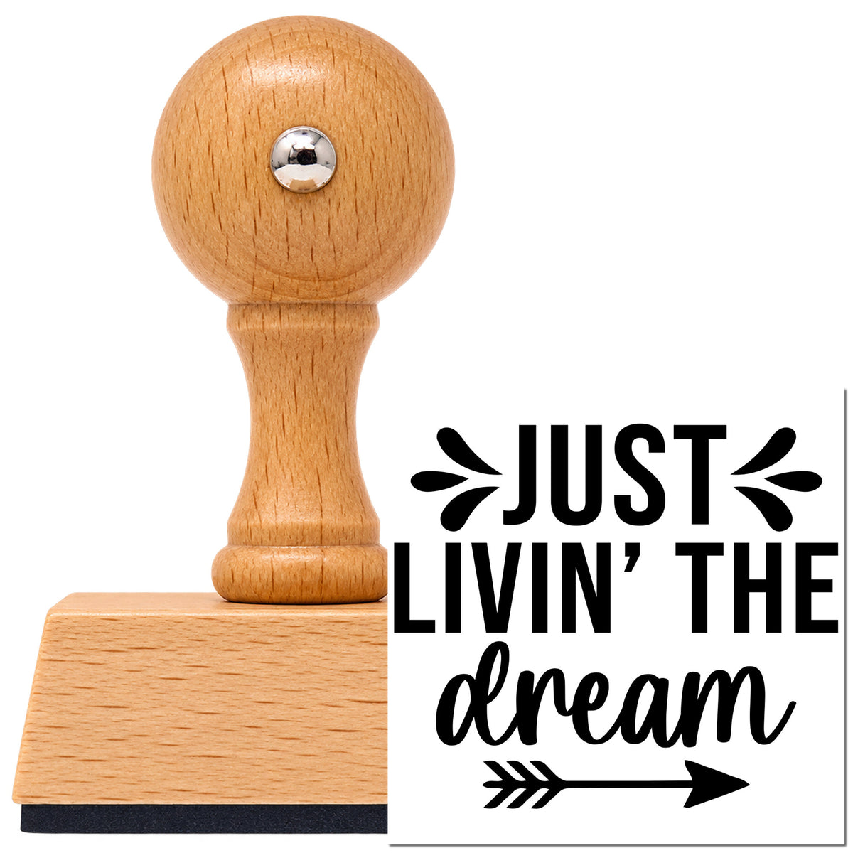 Vintage Pro beech wood stamp with a round knob handle, shown with its black Just Livin' The Dream Arrow imprint on white.