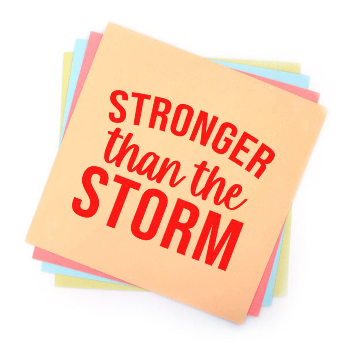 Stacked pastel stamp-and-seal note pads with bold red Stronger than the Storm text on peach paper.