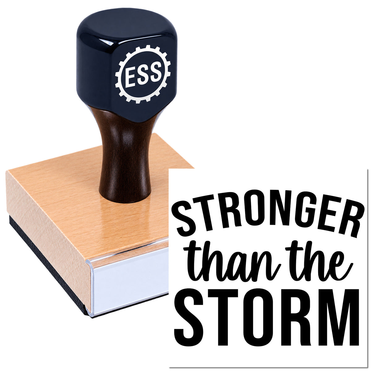Black ESS self-inking stamp on tan wooden block with white seal reading Stronger than the Storm.