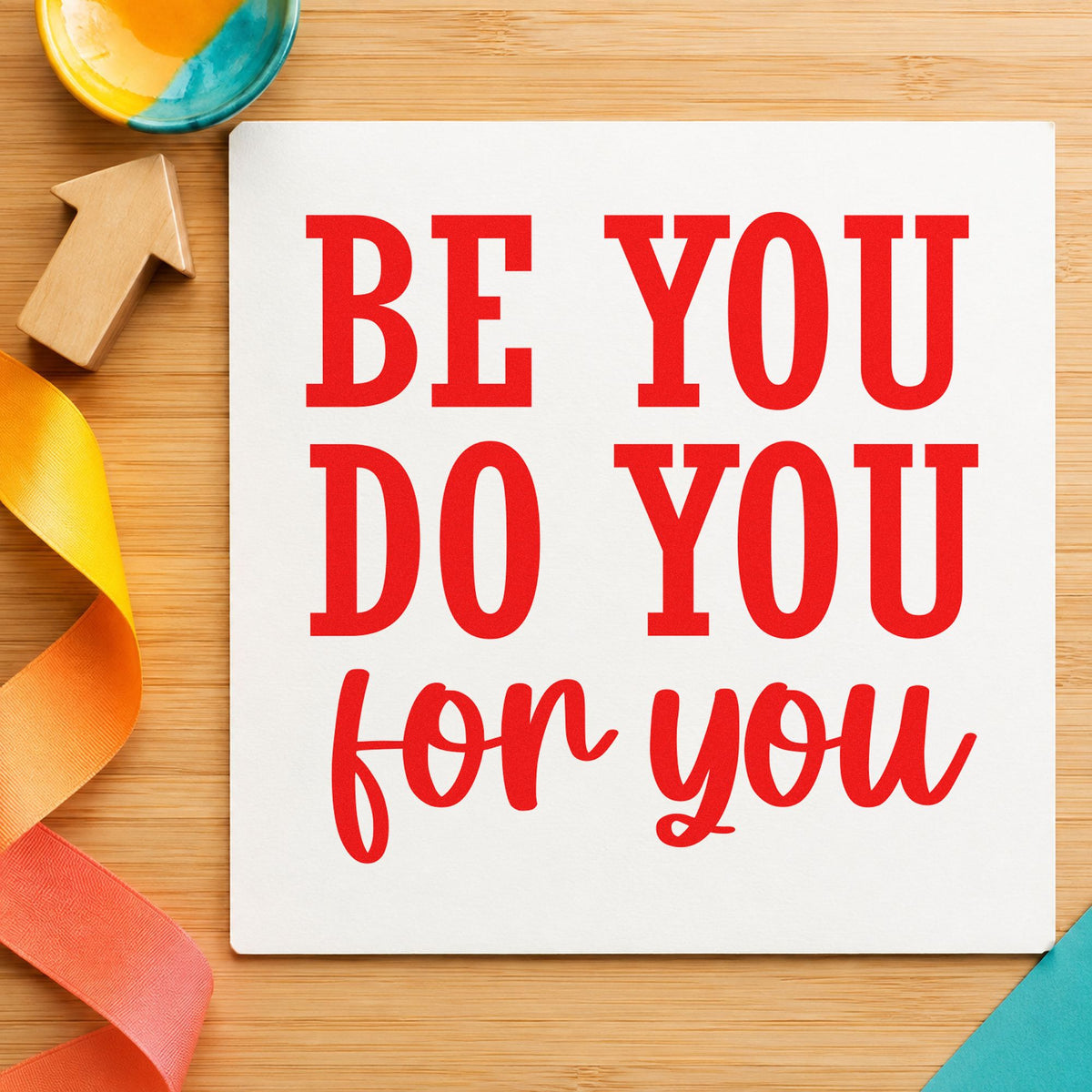 Be You Do You rubber stamp shown in red ink, stamped for projects such as rack costume labels.