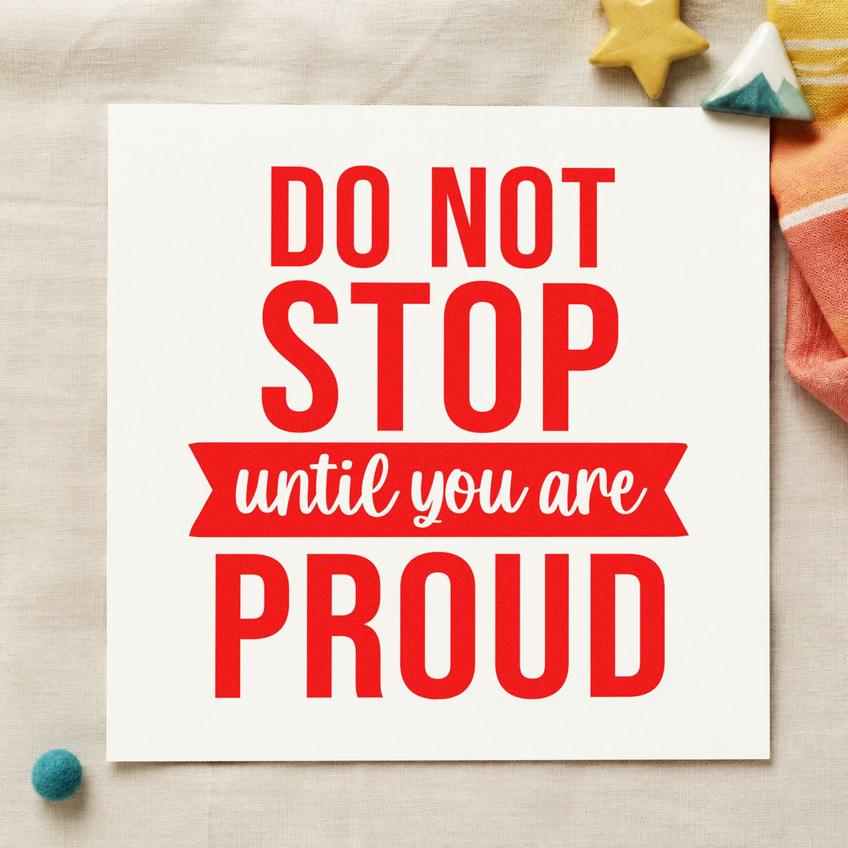 Don't Stop Until Proud rubber stamp shown in red ink, stamped for projects such as tin entry labels.