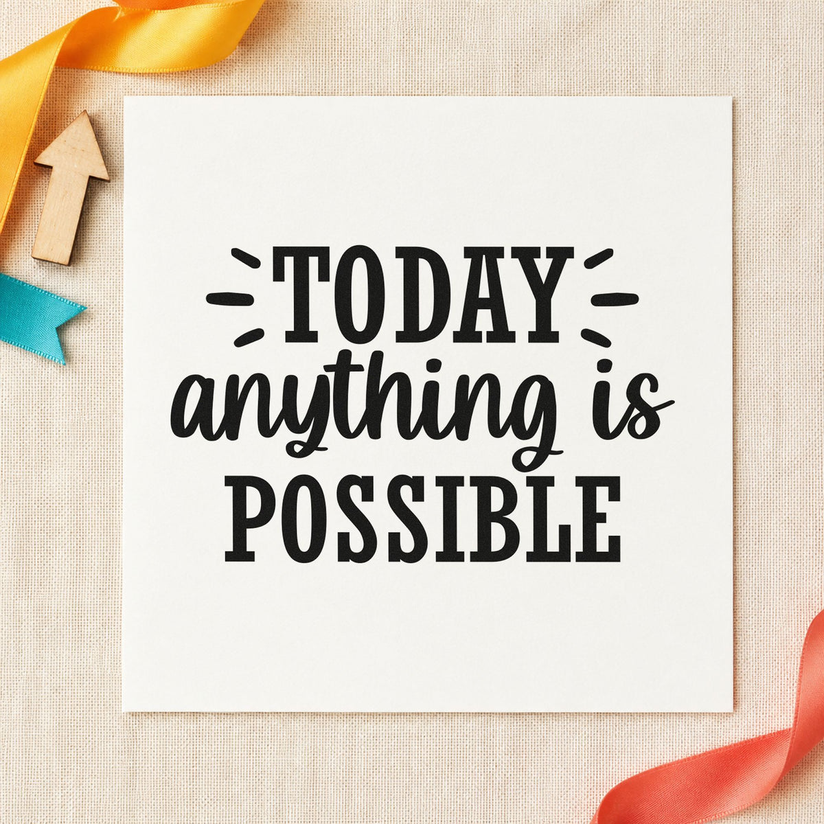 Today Anything Is Possible craft stamp imprint in black ink on a handmade project, one idea being act prop gift tags.